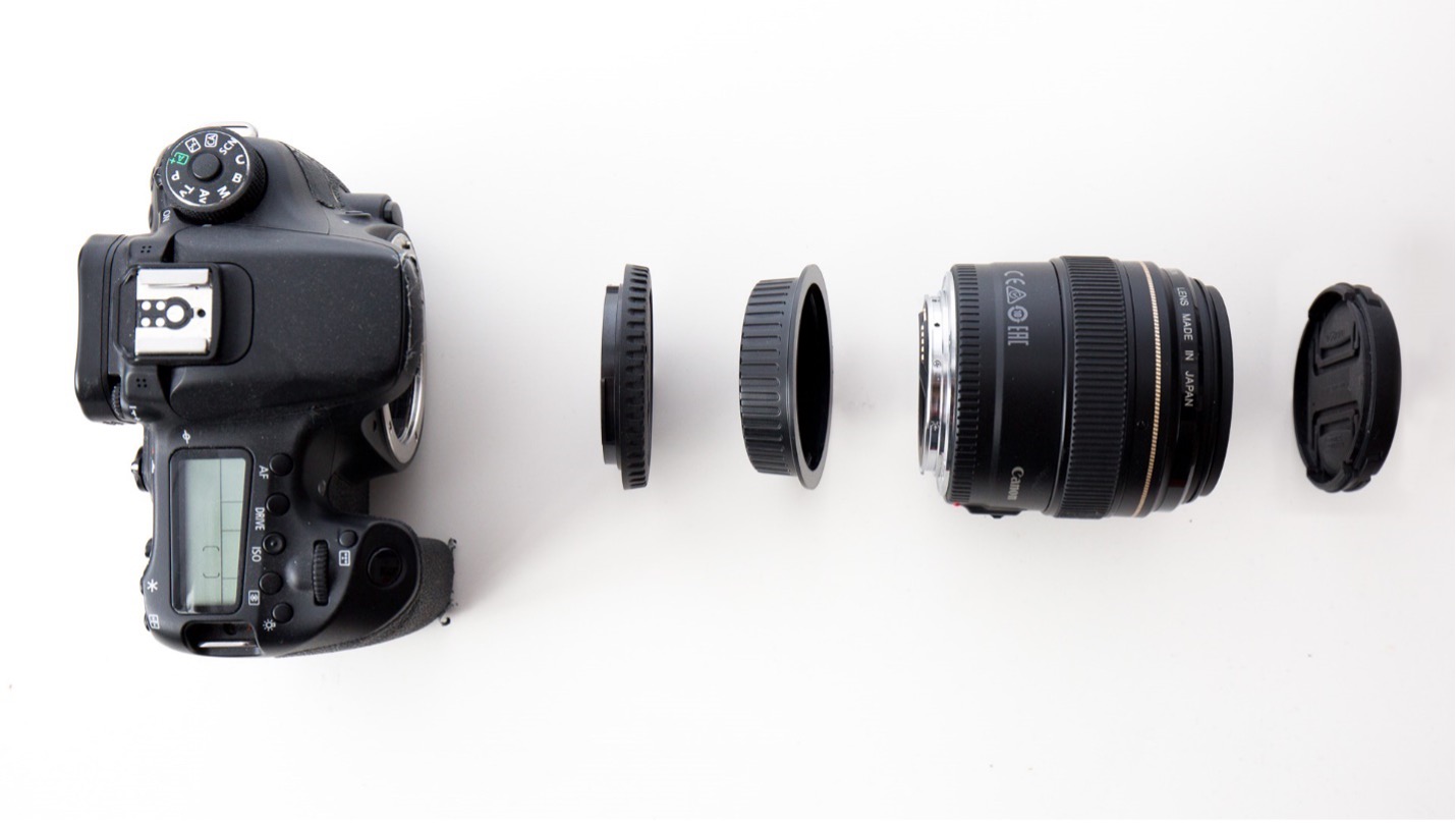 Left to Right: Camera Body, Camera Body Cap, Lens Body Cap, Lens, Lens Cap