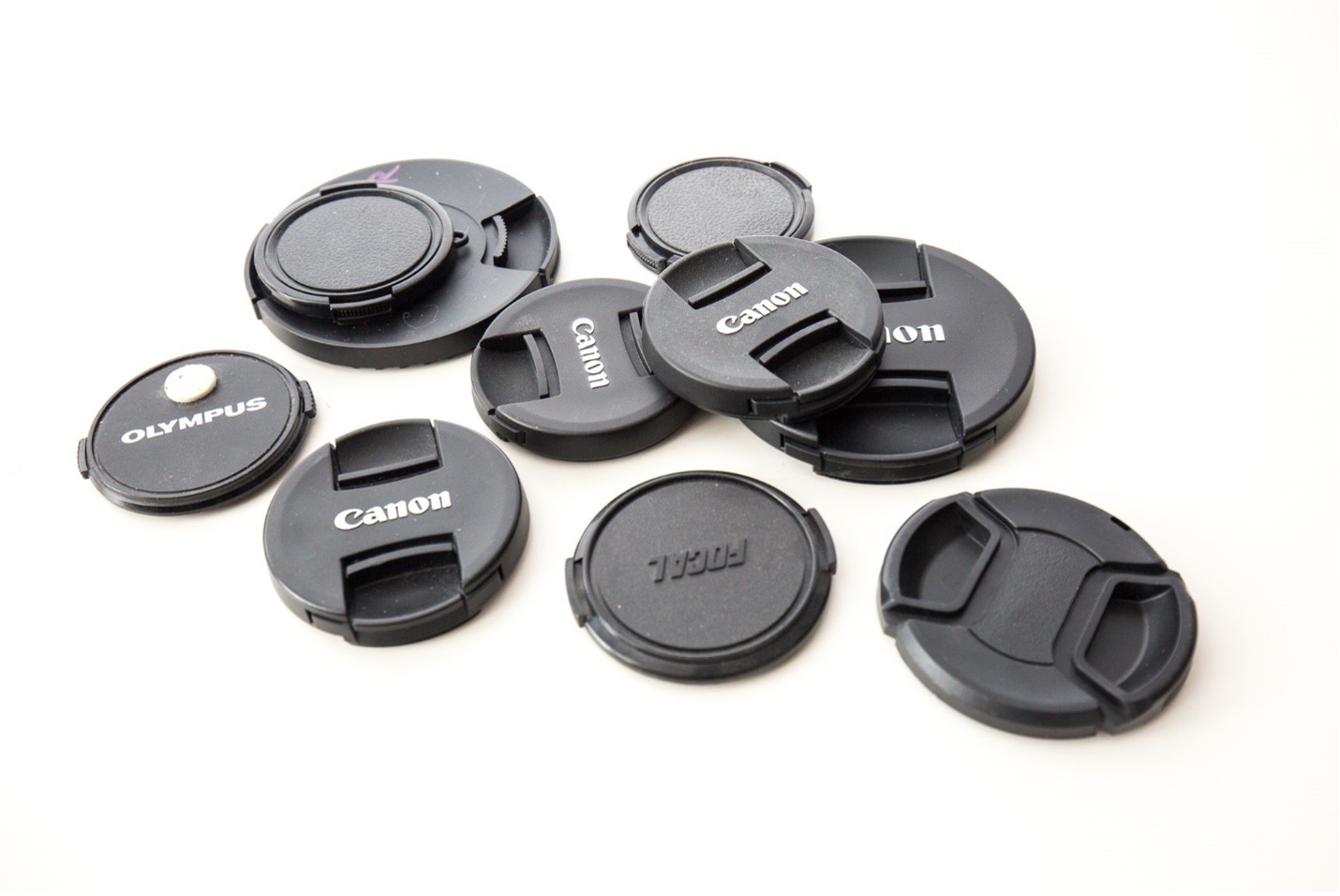 An assortment of lens caps
