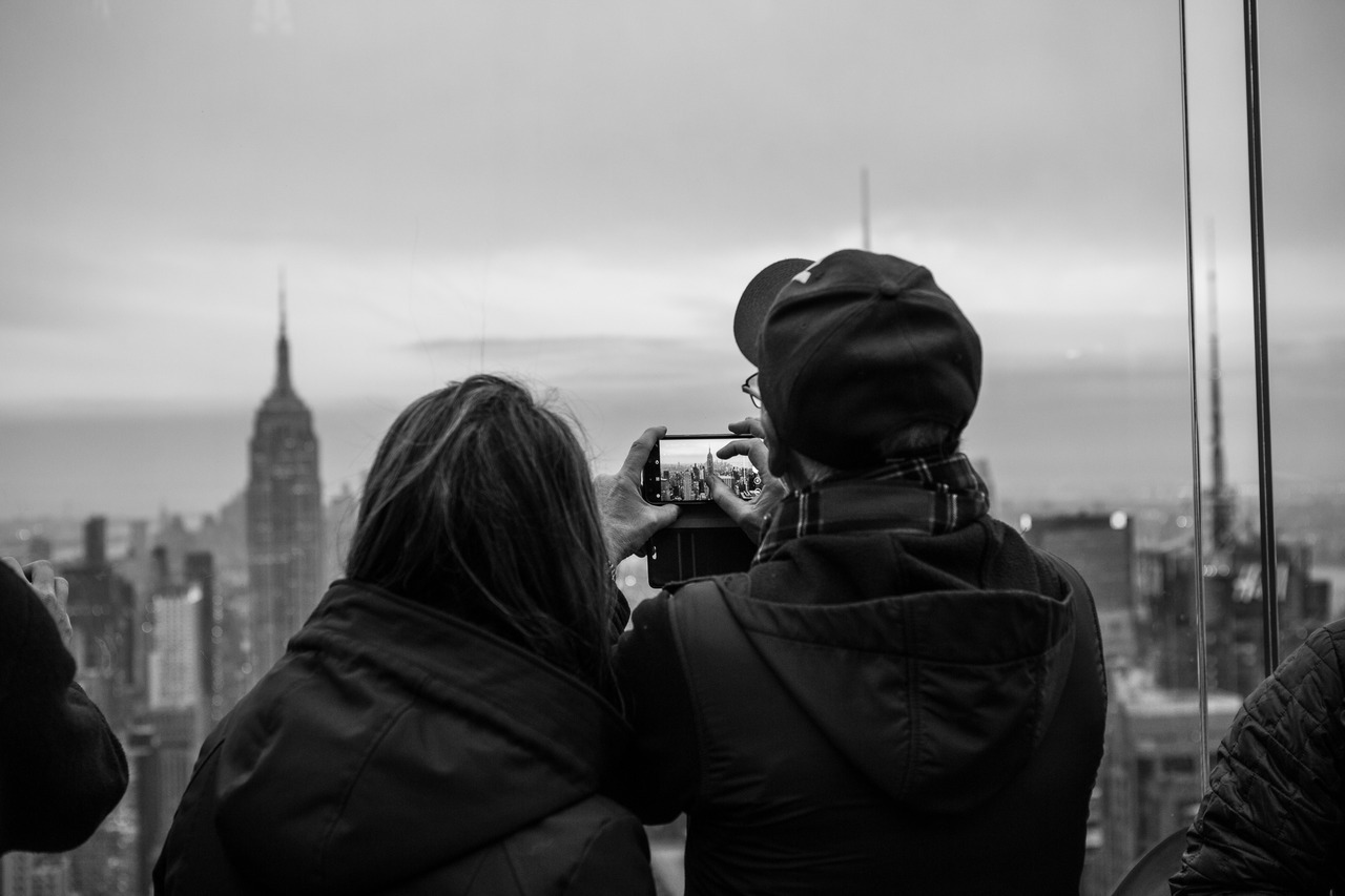 Tourists take a photo of the Empire State Building. Photo by the author.